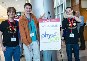 Students gather near the welcome sign at SLAC. Photo by Ken Cole