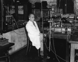 Portrait of Elmer Imes working in a laboratory