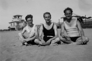 Emilio Segrè, Enrico Persico and Enrico Fermi sitting on beach