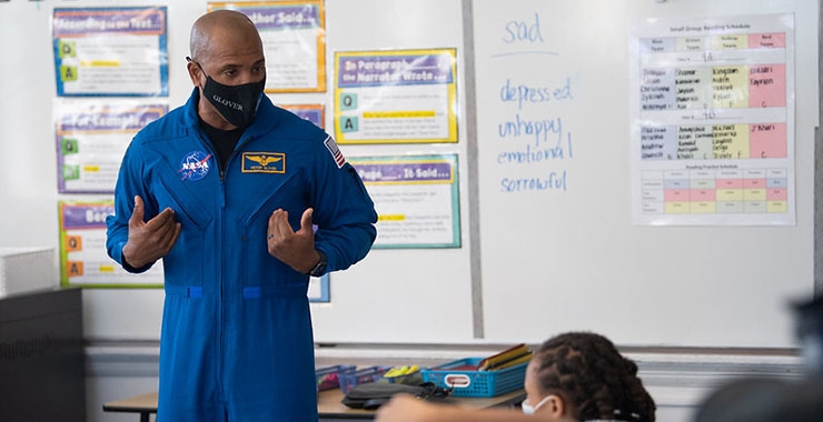 Astronaut Victor Glover speaking at elementary school