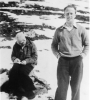 Niels Bohr (left) and Werner Heisenberg (right) outside in the snow, circa 1932.