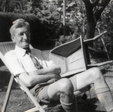 Guy S. Callendar sitting outdoors.