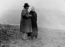 Albert Einstein and Marie Curie outdoors