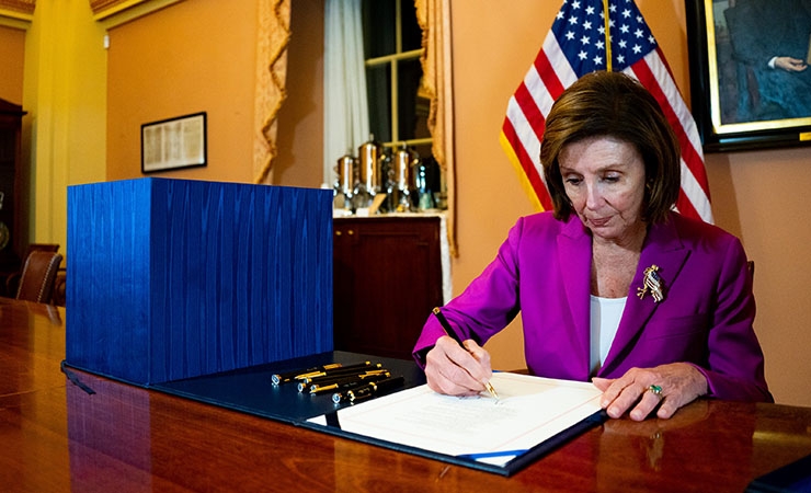 Pelosi signs Infrastructure Act