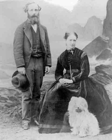 Image of James and Katherine Clerk Maxwell with their dog Toby