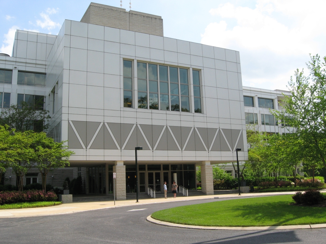 "The cube" of AIP's headquarters building in College Park, Maryland. Two NBLA staff members can be seen standing beneath it.