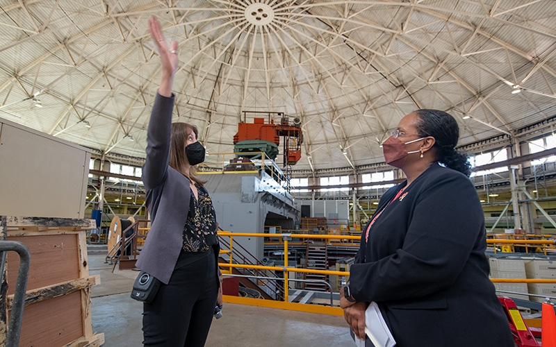 DOE Office of Science Director Asmeret Asefaw Berhe, right, touring Berkeley Lab’s Advanced Light Source