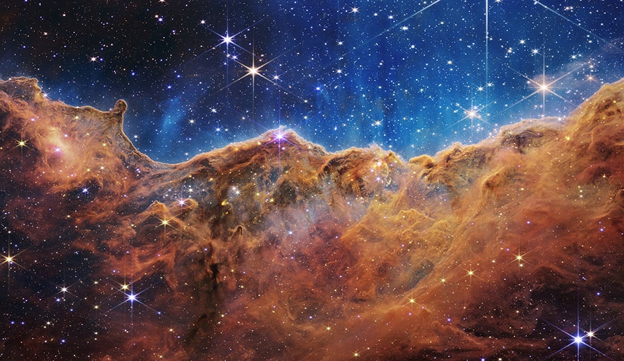 “Cosmic Cliffs” in the Carina Nebula, captured by JWST. Credit: NASA, ESA, CSA, STScI