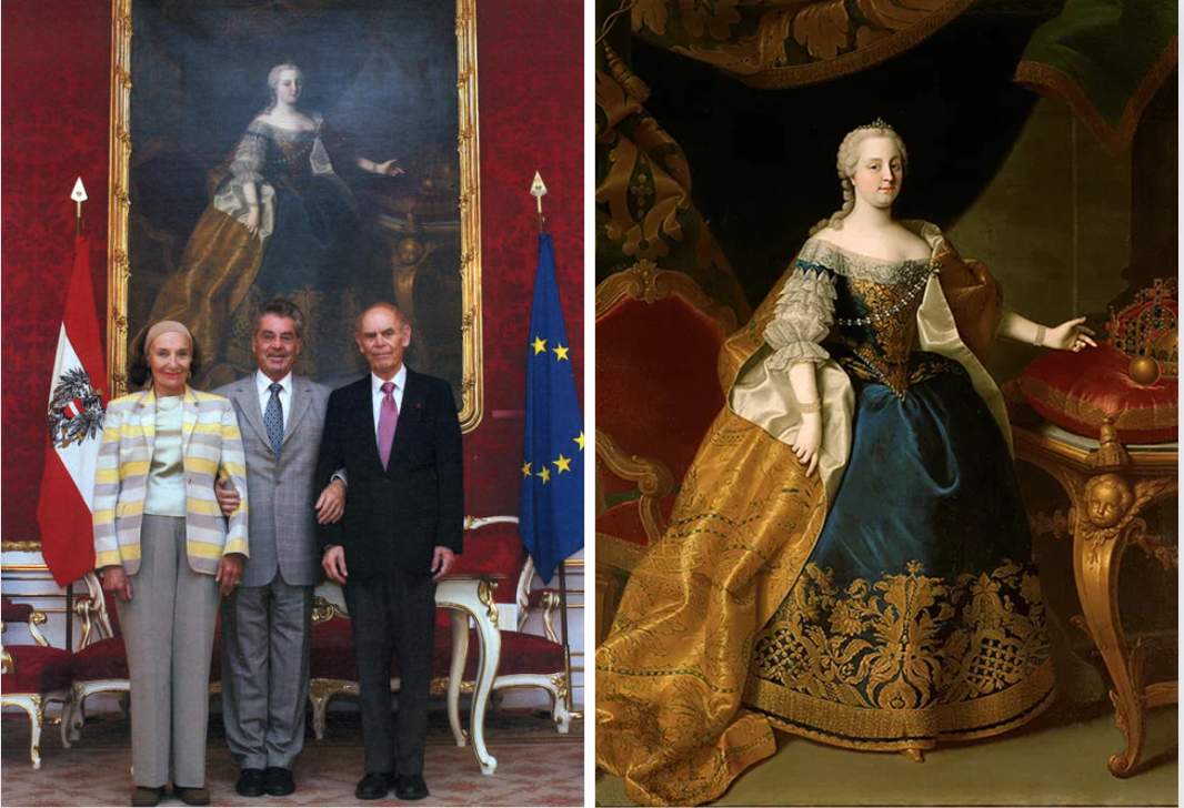 Three people stand together, holding each others' arms, in front of a portrait of Maria Theresa (left), portrait of Maria Theresa (right)