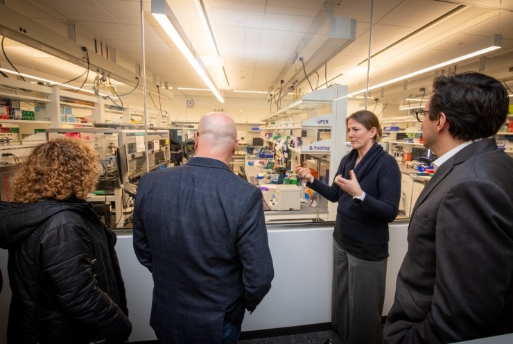 Kjiersten Fagnan, chief informatics officer of the Joint Genome Institute, discusses the lab’s work with PCAST members during a visit this past January.