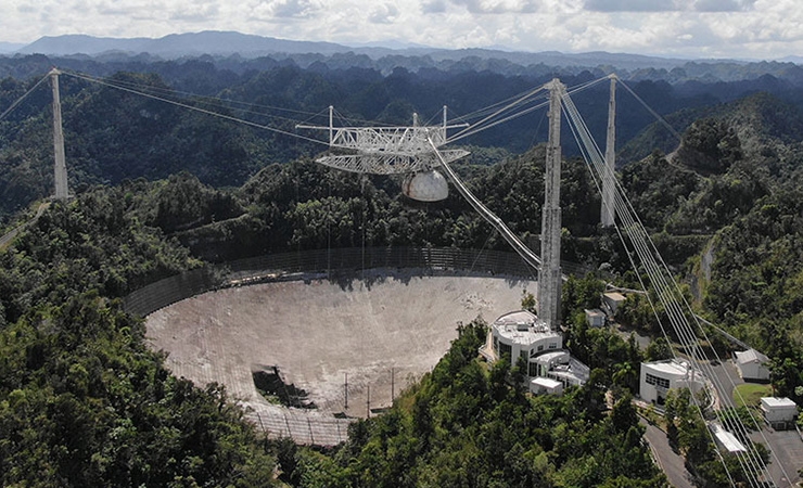 The damaged Arecibo telescope