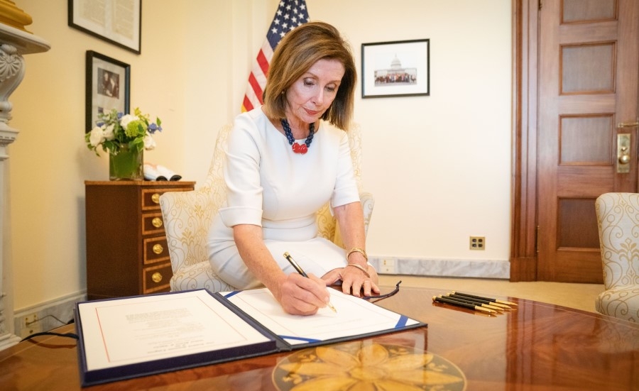 House Speaker Nancy Pelosi (D-CA) signs a stopgap measure on Sept. 27 to extend funding for federal agencies through Nov. 21. President Trump signed it into law later that day.&nbsp;