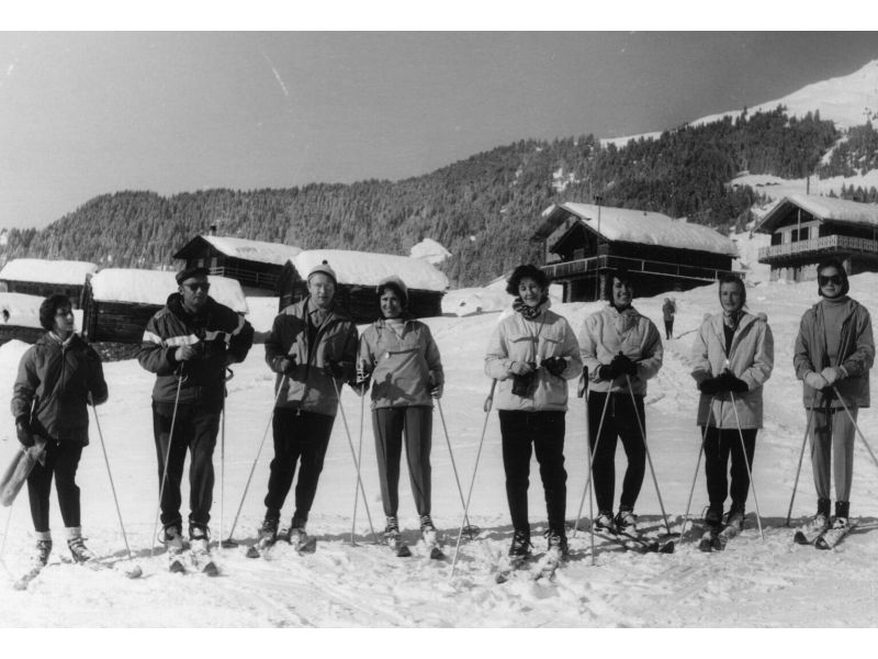 Val and Lia Telegdi pose with an unidentified group outdoors at a ski lodge in Verbier, Switzerland, in January 1960.