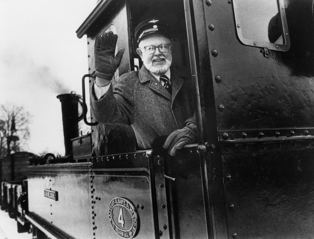 William A. Fowler waves from a train, 1983. 