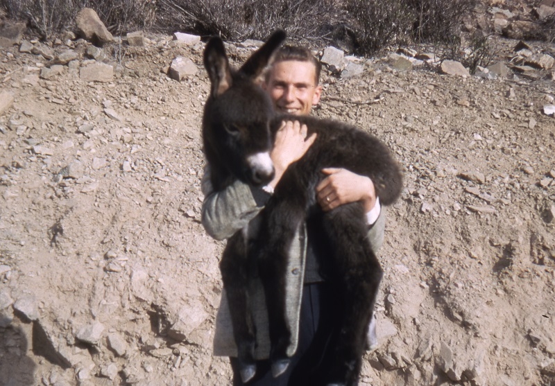   Manfred Wagner holding an animal at Lonely Cactus Pass.
