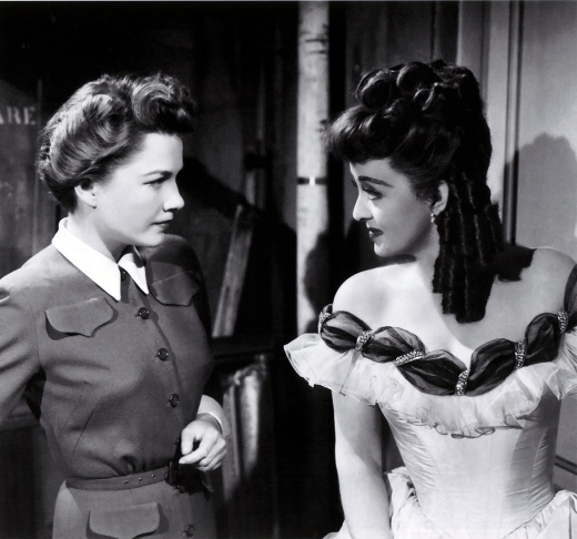 In All About Eve, actress Eve Harrington, Anne Baxter, left, secretly and deviously works to supplant her mentor, actress Margo Channing, Bette Davis, right. The 1950 movie won six Academy Awards, including Best Picture. CREDIT: 20th Century Fox